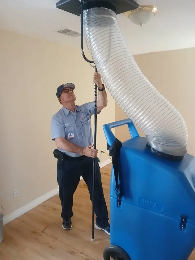 HVAC Installation technician using HEPA equipment in Cypress